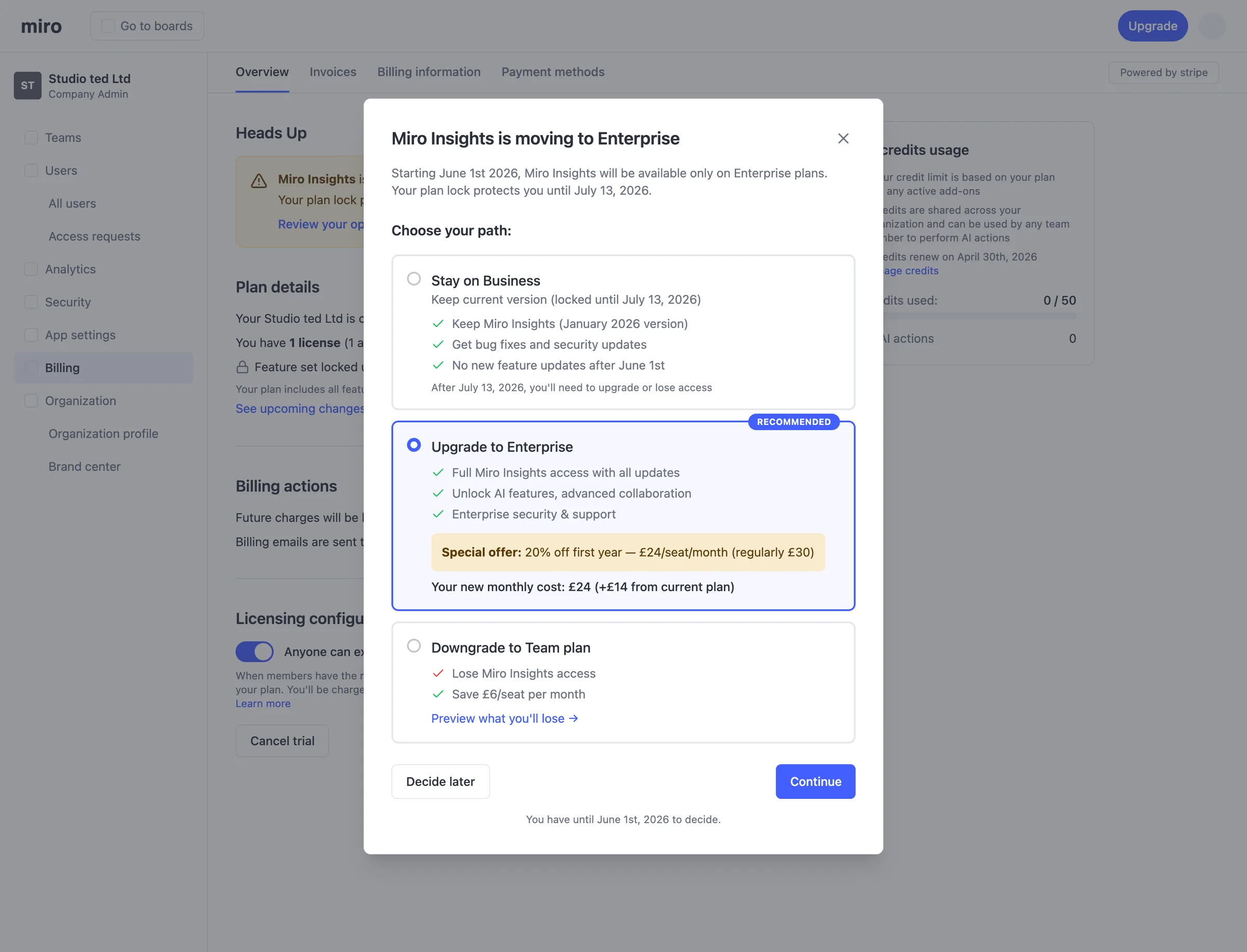 Variant: the Choose your path dialog with three options: stay on Business, upgrade to Enterprise (recommended, 20% off the first year) and downgrade to Team, plus Decide later.